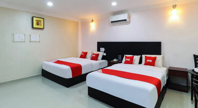 Кровать в общем номере OYO 89473 Sp Venture Hotel