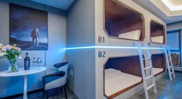 Кровать в общем номере Heguang ALIENSAPCE E-Sprot Hotel(Xichang Qionghai 17 Degree Wanda Plaza Store)