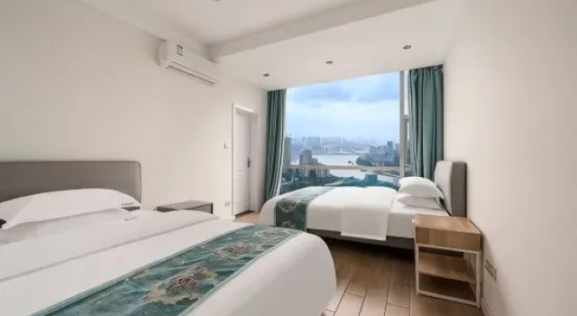 Люкс с 2 комнатами с видом на реку Yimingju Apartment (Chongqing Liberation Monument Pedestrian Street)