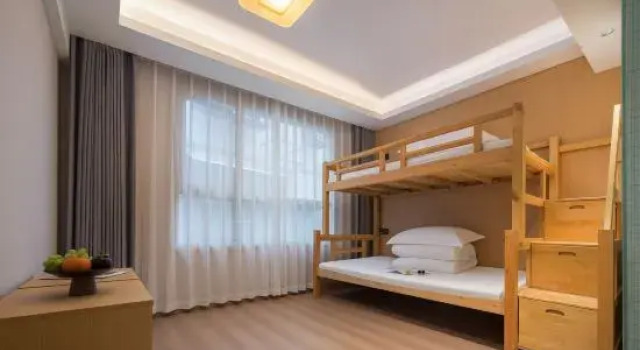 Семейный люкс Zhangjiajie Huan Sha Ju Hotel一Newly opened in 2026 一robot service一coffee bar 一24 hour ice supply一free washing machine and dryer 一close to East Gate Ticket Office一Baofeng Lake一Huanglong Cave Scenic Area