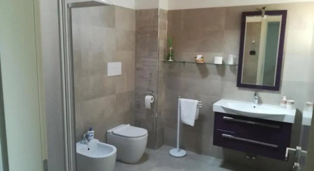 Четырёхместный номер Deluxe B&B Casa Santa Lucia