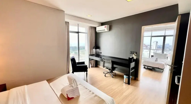 Четырёхместный семейный номер Standard с видом на город ASIA MELAKA HOTEL managed by The Straits Hotel & Suites 马六甲亚逸酒店