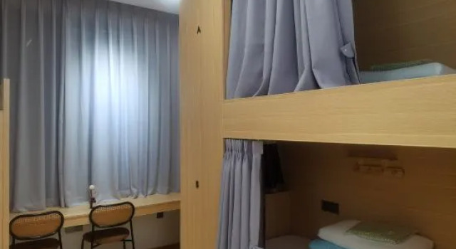 Кровать в общем номере (женский номер) Chaoge Youth Hostel (Dali Ancient Town South Gate)