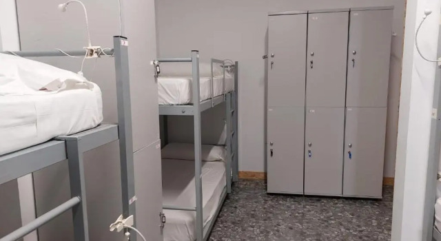Кровать в общем номере Italica Hostel