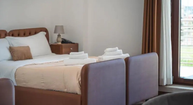 Четырёхместный номер Classic с балконом Kairos Hotel