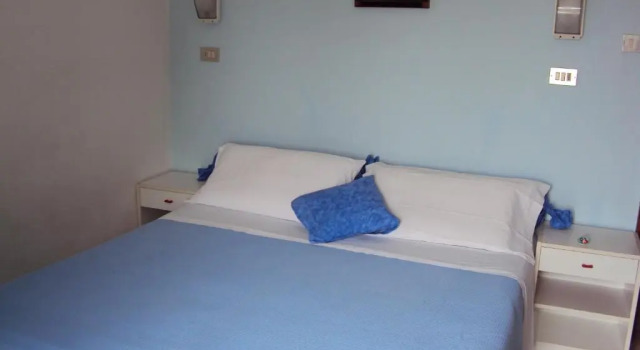 Четырёхместный номер Standard с балконом Albergo Maria Gabriella