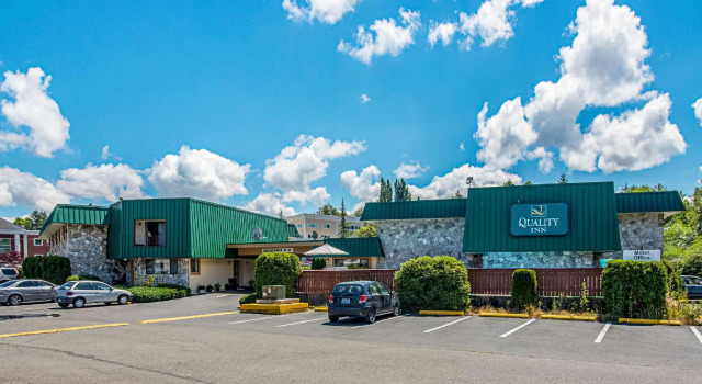 Кровать в общем номере Quality Inn Olympia