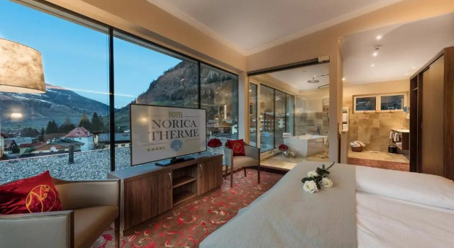Люкс Sky Palais Hotel Norica - Thermenhotels Gastein mit dem Bademantel direkt in die Therme