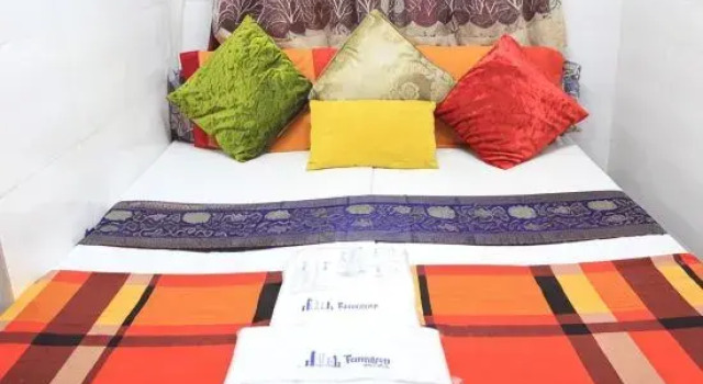 Кровать в общем номере Kamal Deluxe