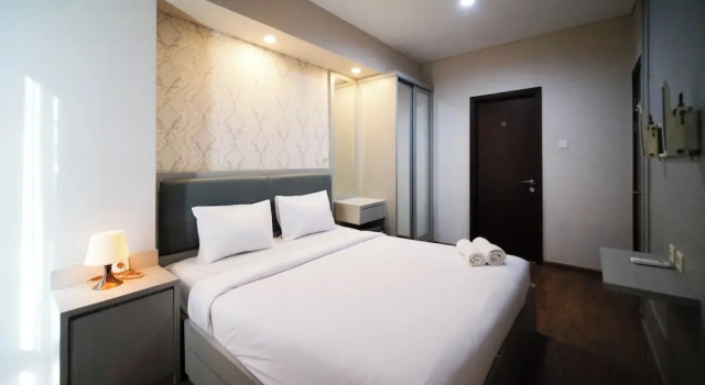 Апартаменты Modern and Cozy 1BR at Grand Sungkono Lagoon Apartment By Travelio