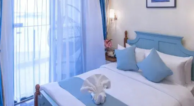 Люкс с 2 комнатами с балконом и с видом на море Evergrande Garden Apartment Hotel Haikou Bay
