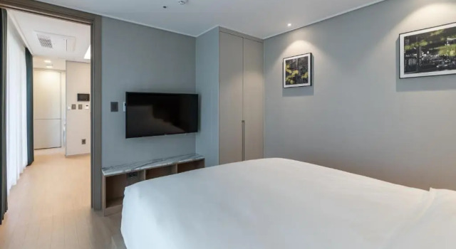 Camera doppia Deluxe con parziale vista mare D OV Haeundae Hotel