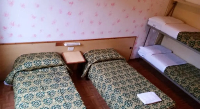 Кровать в общем номере Hotel Giovannina
