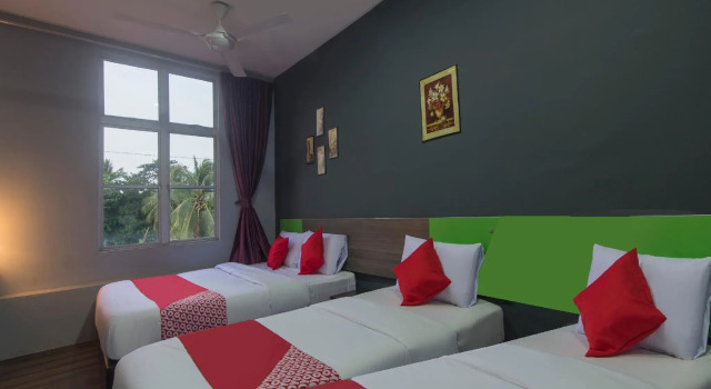 Семейный люкс OYO 937 Lucky Hotel