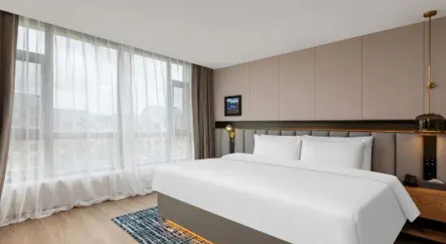 Люкс Deluxe Meilun Hotel (Second Avenue Baihe Store, North Slope Distribution Center, Changbai Mountain)