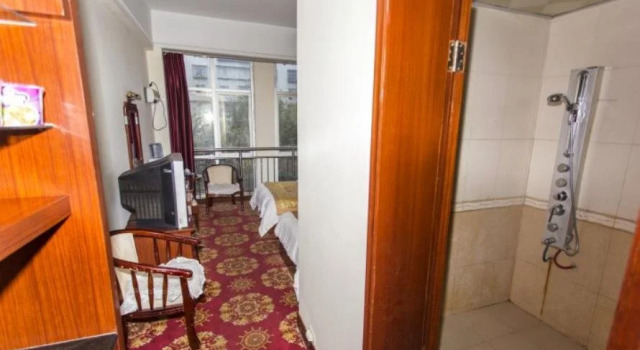 Qujing Desheng Hotel, Buchen Sie Hotel Qujing Yunnan