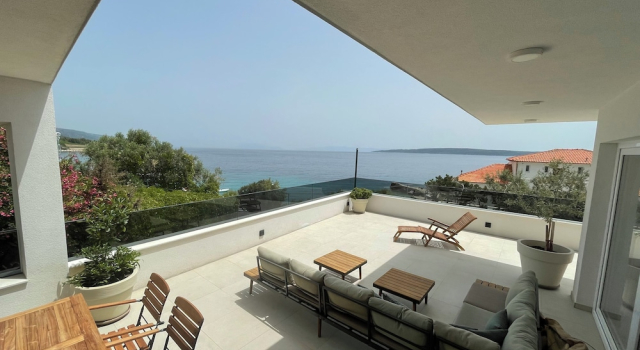 Апартаменты Exclusive Seafront Suites with hot tub