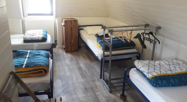 Кровать в общем номере Chambre d'hôtes L'Oustal