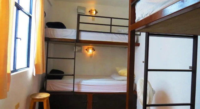 Кровать в общем номере La Catrina Hostel