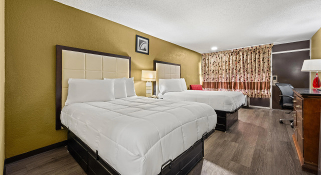 Четырёхместный номер Standard Americas Best Value Inn - Wilson