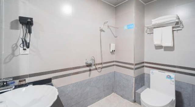 Xingyue Hotel (Wuhua Shuizhai Town)