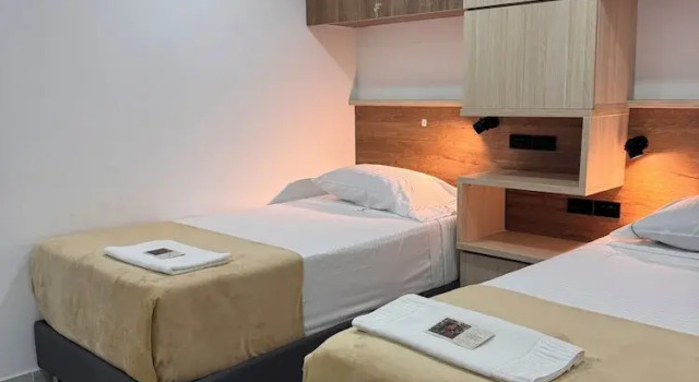 Кровать в общем номере Vida Hostel