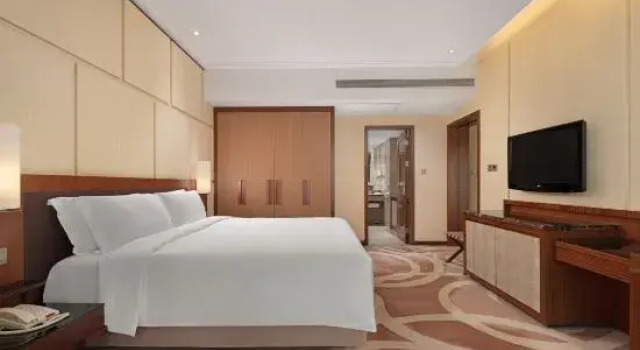 Семейный люкс New World Dalian Hotel