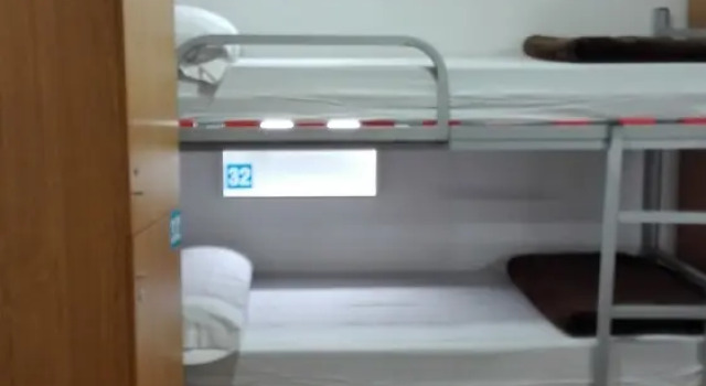 Кровать в общем номере Albergue Boente