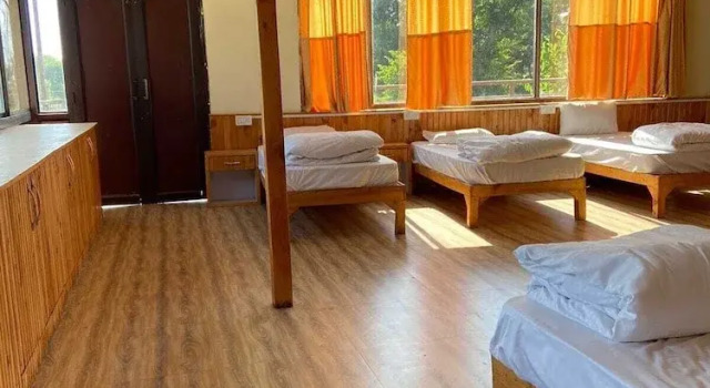 Кровать в общем номере Pink Park By Panache Hotel