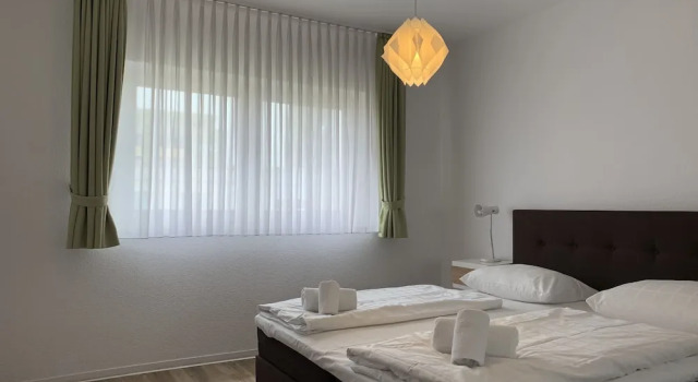 Семейные апартаменты с 3 комнатами с балконом Airport Apartment Köln/Bonn