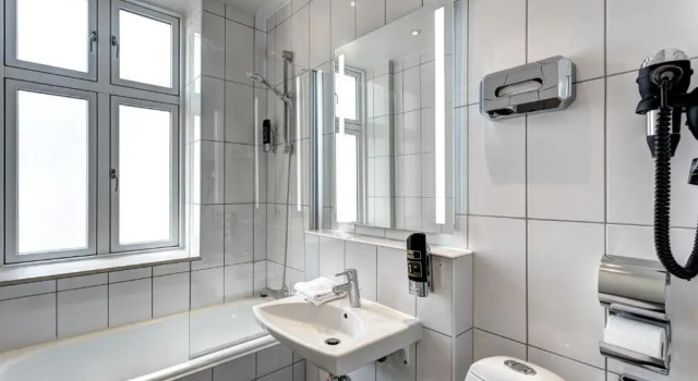 Кровать в общем номере MEININGER Hotel Copenhagen
