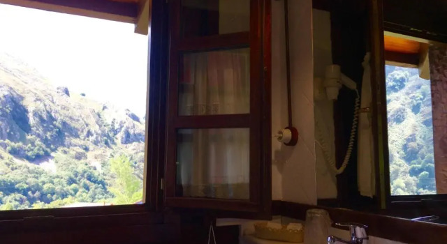 Коттедж с 2 комнатами с видом на сад Casa Rural La Riba