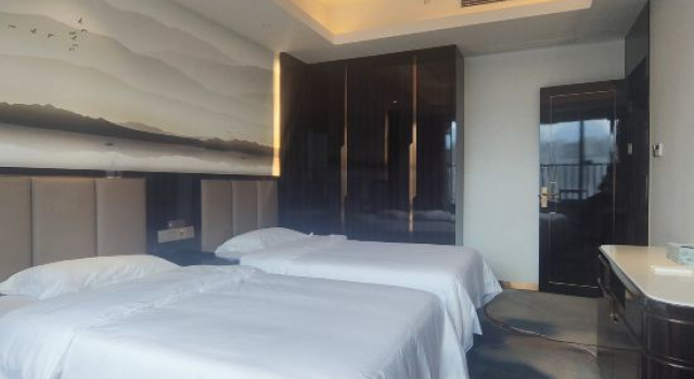 Семейный люкс с 2 комнатами Yuxuanyuan Homestay (Tiyuyu Road)