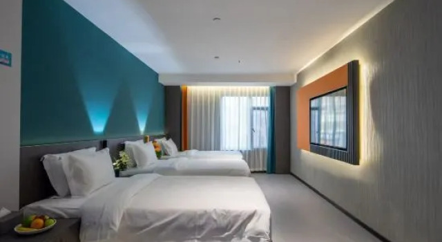 Кровать в общем номере Aidianjing Hotel (Shangrao Guangfeng Passenger Transport Terminal Branch)