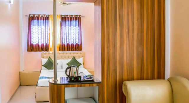 Номер Deluxe Treebo Naunidh Suites