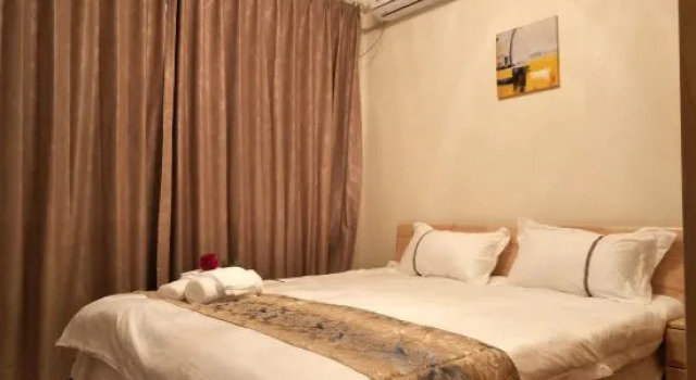 Семейный люкс с 3 комнатами Qidong Risheng Donghai Holiday Apartment