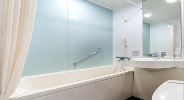 Кровать в общем номере (женский номер) Daiwa Roynet Hotel Morioka