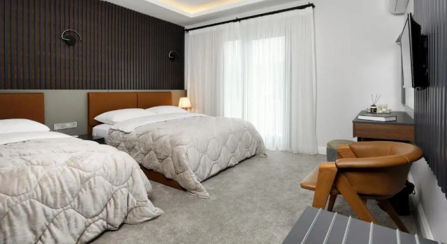 Luksusowy trzyosobowy pokój Didi Hotel