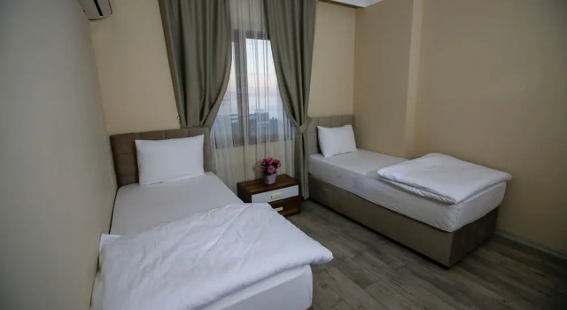 Семейные апартаменты с 3 комнатами Jalal VIP Suite Hotel