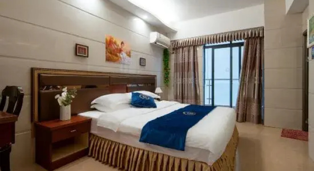 Люкс Deluxe с 2 комнатами с балконом и с видом на море Huanlege Hotel