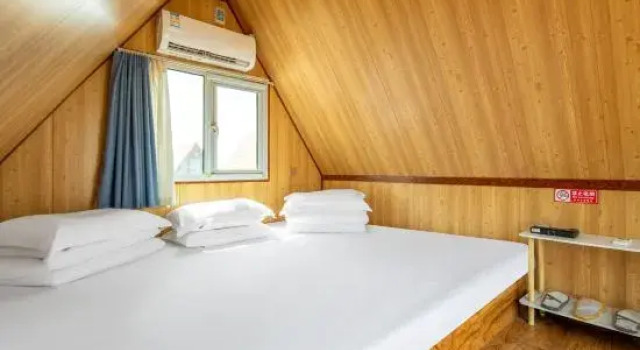 Bett im Wohnheim Bantuan Camping