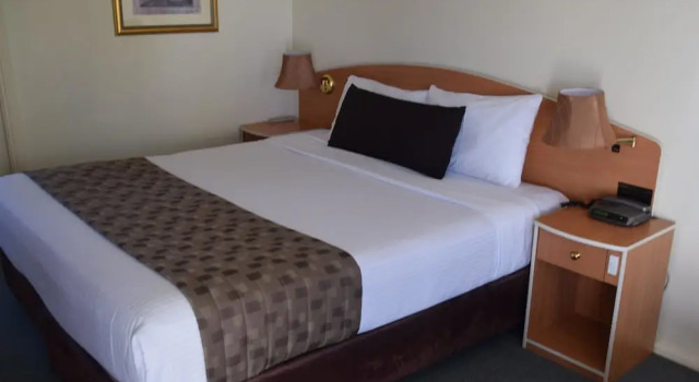 Номер Executive Coachmans Inn Motel