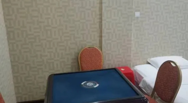 Четырёхместный люкс Tangwanghe Weishi Business Hotel
