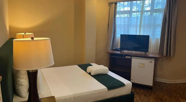 Coco Grande Hotel, Забронировать Отель Думагете Negros Oriental, рядом с Бульвар Рисаль