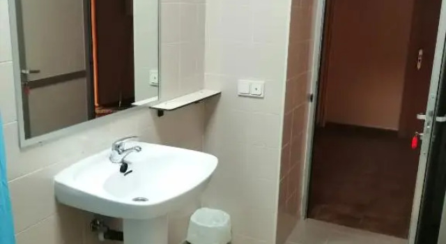 Кровать в общем номере Casa Raspa