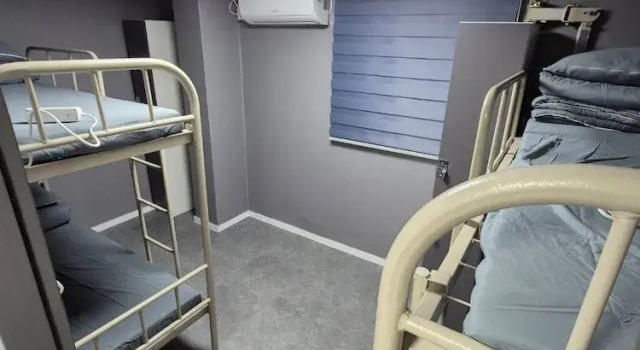 Кровать в общем номере Gangnam Seven Hostel
