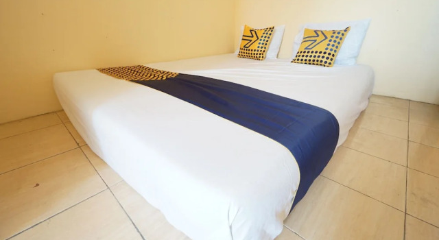 Номер Economy OYO Life 93300 Homestay Puri Anggrek Syariah - Wage