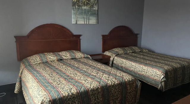 Surf Motel and Apartments, Забронировать Апартаменты/квартира Галвестон Texas Gulf Coast, рядом с UTMB Health John Sealy Hospital
