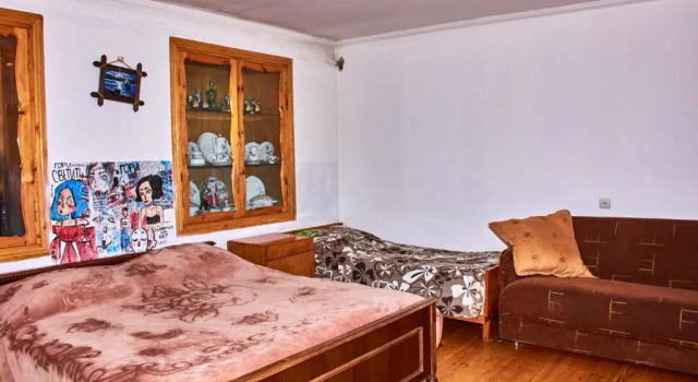 Кровать в общем номере Guest House Svetlana