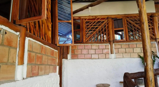 Кровать в общем номере Hotel Arqueológico San Agustín